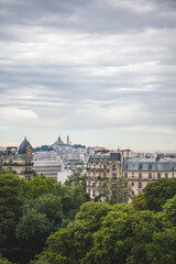 View of Montmartre from the Parc des Buttes Chaumont in Paris, France on an Overcast Day
