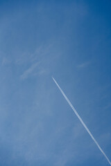 Clear Blue Sky with Airplane Contrail
