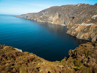 View on amazing Slieve league Cliff, county Donegal, Ireland. Popular travel landmark area with stunning nature view and hiking route. Nobody. Warm sunny day. Travel and tourism. Irish nature