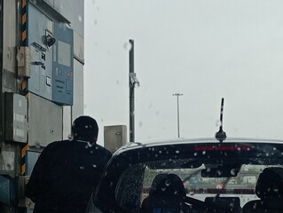 man stuck at the motorway toll booth
