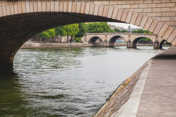 Fototapeta premium View of the Seine River in Paris, France on an Overcast Day 