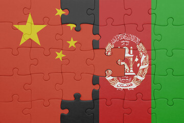 puzzle with the colourful national flag of afghanistan and flag of china .