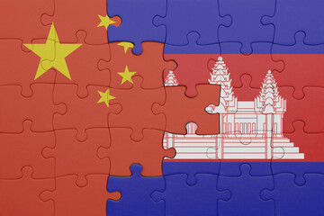 puzzle with the colourful national flag of cambodia and flag of china .