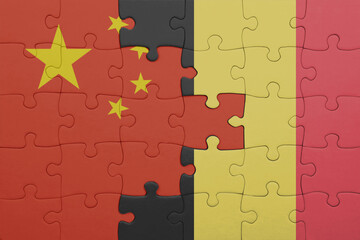 puzzle with the colourful national flag of belgium and flag of china .