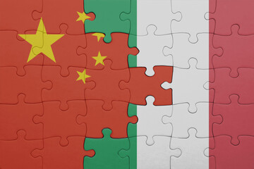 puzzle with the colourful national flag of italy and flag of china .