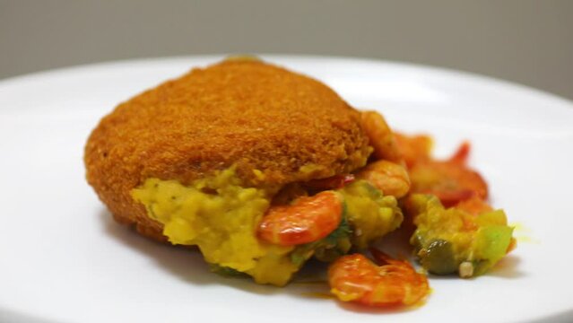 Traditional Brazilian acaraj&eacute;, food of African origin based on vatap&aacute;, caruru and dry shrimp 