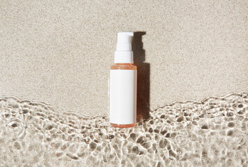 skincare mockup, with sand and waves flatlay with blank lable