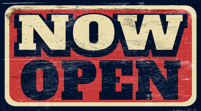 Aged retro now open sign on wood