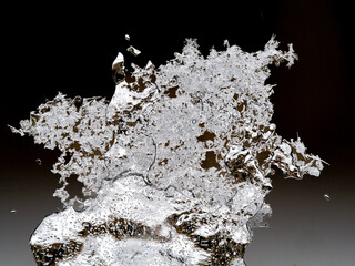 brilliant abstract ice like crystals formed on a window in winter