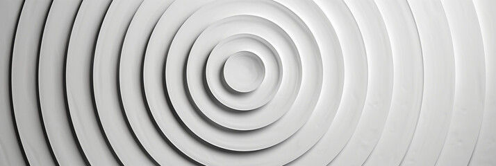 Obraz premium Minimalist design featuring concentric monochrome circles radiating from the center with small height variations, in bright white. 