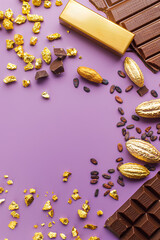 arrangement of chocolate and gold on a purple background