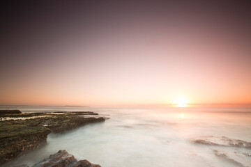 sunrise over rockpools, australia