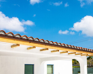 Title roof with wood on a sunny day with beautiful blue sky. 