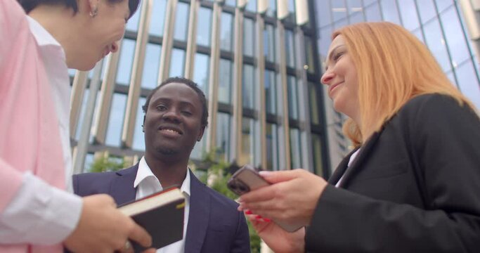 Woman uses smartphone to clarify information. Through mobile devices individuals access, share, verify information promptly, enhancing productivity. Smartphone to verify or seek additional information
