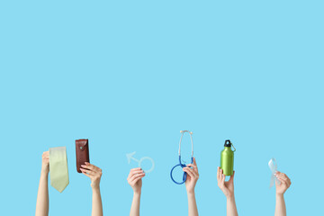 Female hands with tie, male sign, stethoscope and light blue ribbon on color background. Prostate cancer concept