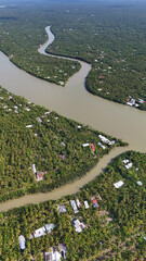 Amazing aerial view of Mekong Delta, vast coconut, nipa tree field, irrigation system by canal with...