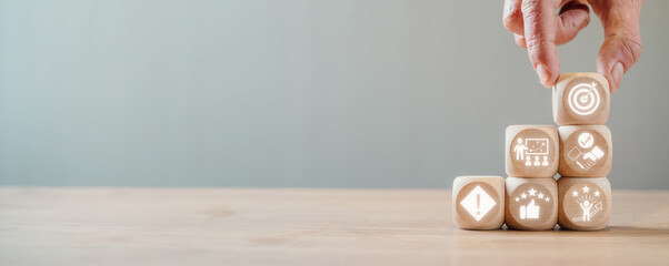 Mentoring concept, Hand holding wooden block on desk with goals, coaching, trust, incident,...