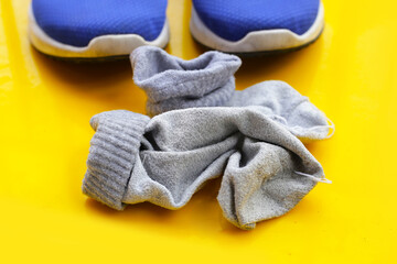 Blue sneakers with dirty socks