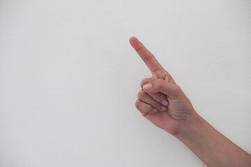 Close-up of hand showing number one gesture isolated on white background.