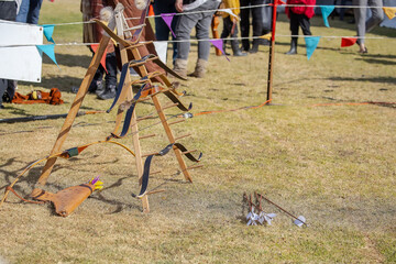 Medieval archery equipment, wooden bow and arrow 