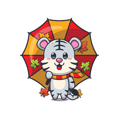 Cute white tiger with umbrella at autumn season