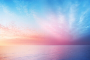 Naklejka na ściany i meble Serenely colorful sunset over the ocean, where soft pink and blue hues meld into a tranquil horizon, evoking peace and reflection.