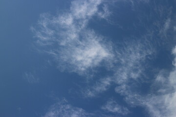 blue sky with white, soft clouds