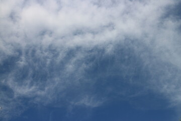 blue sky with white, soft clouds