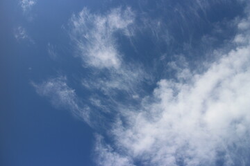 blue sky with white, soft clouds