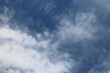 blue sky with white, soft clouds