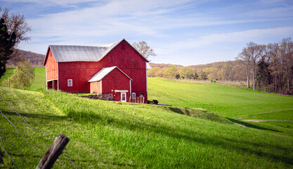 Red barn in farm field in New York State