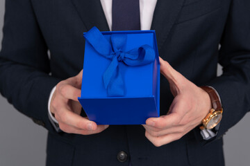 Corporate reward present. Mens day present. Successful man share gift box. Businessman prepare for...