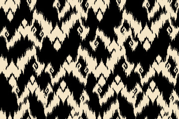 Ikat paisley embroidery on the fabric in Indonesia,India and asian countries.geometric ethnic oriental seamless pattern.Aztec style. illustration.design for texture,fabric,clothing,wrapping,textile © Manu