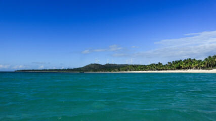 Pristine beach with clear blue water and fine white sand in Asia