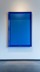 A glossy, cobalt blue frame on a stark white wall, its vivid color providing a bold statement in a modern interior design. 32k, full ultra HD, high resolution