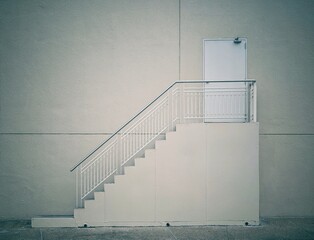 Stairs outdoor building.Stainless steel and wrought iron stair railings