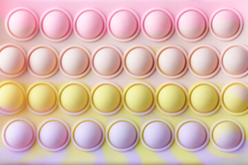 close-up of rubber surface with round bumps background, abstract of circle embossed pattern texture wallpaper or backdrop in flat lay