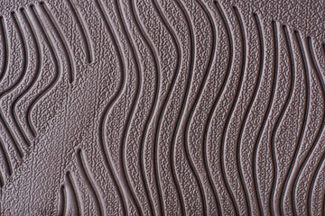 close-up view of sole of shoe pattern, abstract of brown rubber textured and grooves surface of...