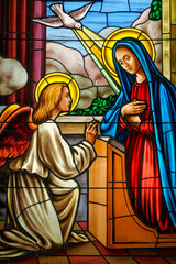 A stained glass of The Annunciation. Vitrail de l'Annonciation. Italie