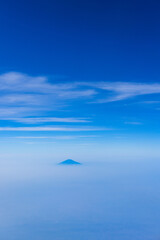 view of the bright blue sky and mountains on the island of Java from the plane window, blue sky with clouds, See Through Plane Window With Blue Sky And Clouds Outside, travel trip over Java island