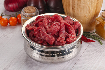 Raw beef meat - sliced strips