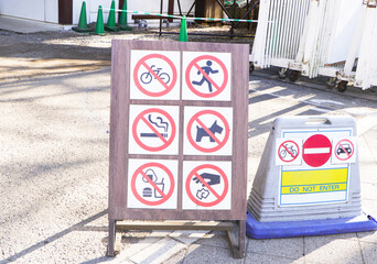 Various prohibition sign as Bicycling is prohibited, People are not allowed to walk past, No...