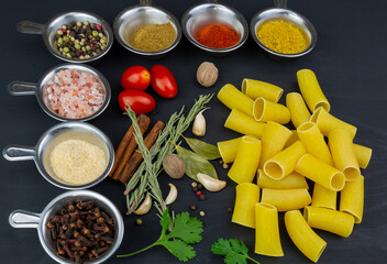pasta on black wooden background