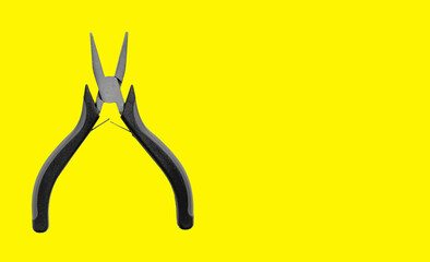 Long needle nose pliers, red grip tool for wire cutting. Industrial mechanic equipment on yellow...