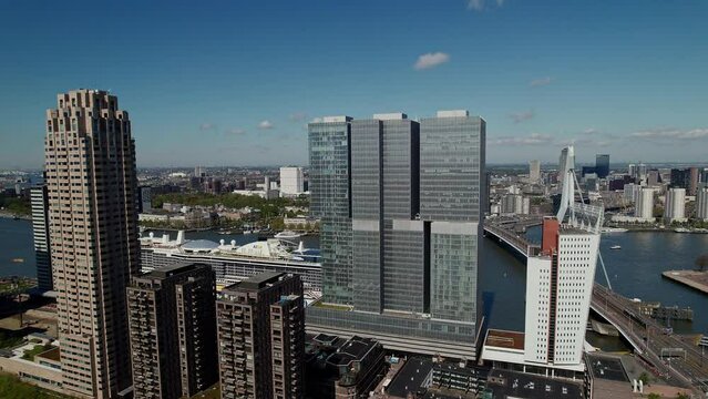Erasmus Bridge, De Rotterdam, And New Orleans In Rotterdam, Netherlands. drone sideways shot
