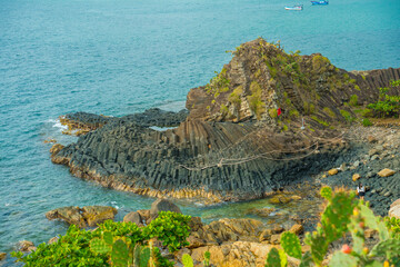 View of Ganh Da Dia or Da Dia Reef is a seashore area of uniformly interlocking basalt rock columns located along the coast in Tuy An town, Phu Yen Province, Vietnam