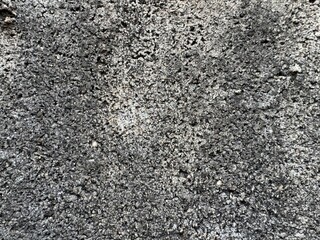 Old black brick wall rough background
