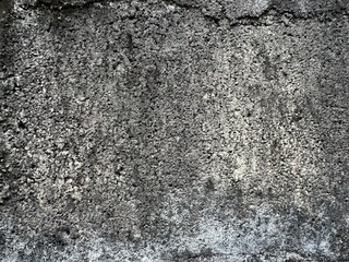 Old black brick wall rough background