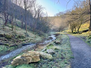 Tideswell Dale Peak District early morning mist 