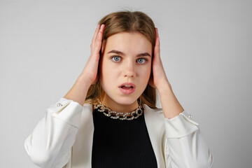 Excited Young Woman in Stylish Outfit Surprised Expression